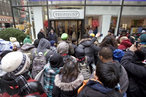 In this photo provided by Nintendo of America, Nintendo fans eagerly await to enter the grand reopening of the remodeled Nintendo NY store in Rockefeller Plaza on Feb. 19, 2016.