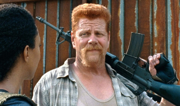 Abraham holding a rifle