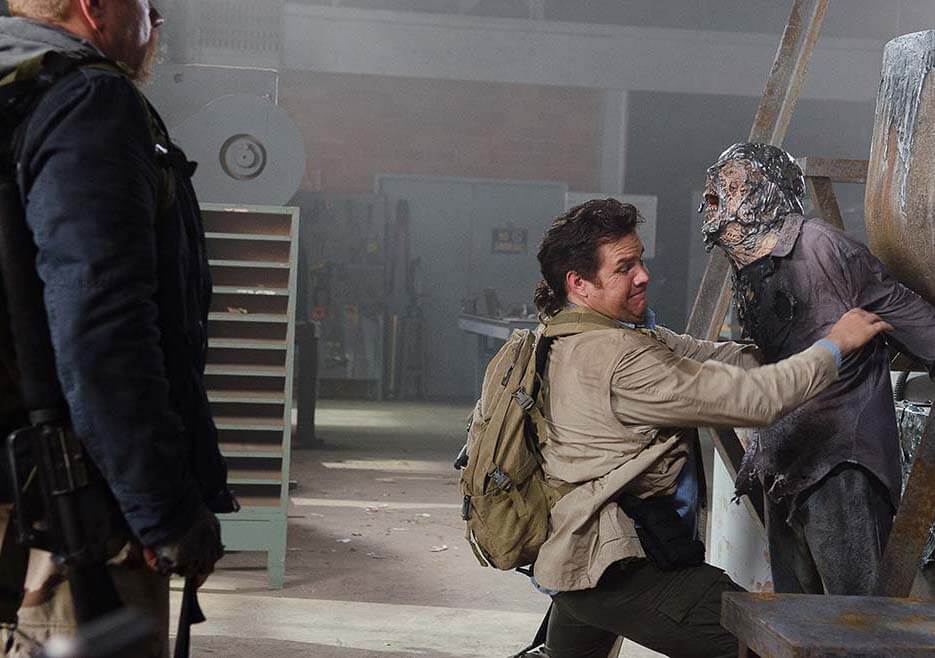 Eugene holding back a walker