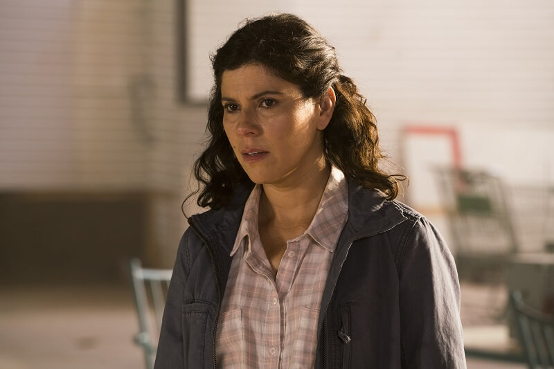 Elena trying to help at the hotel