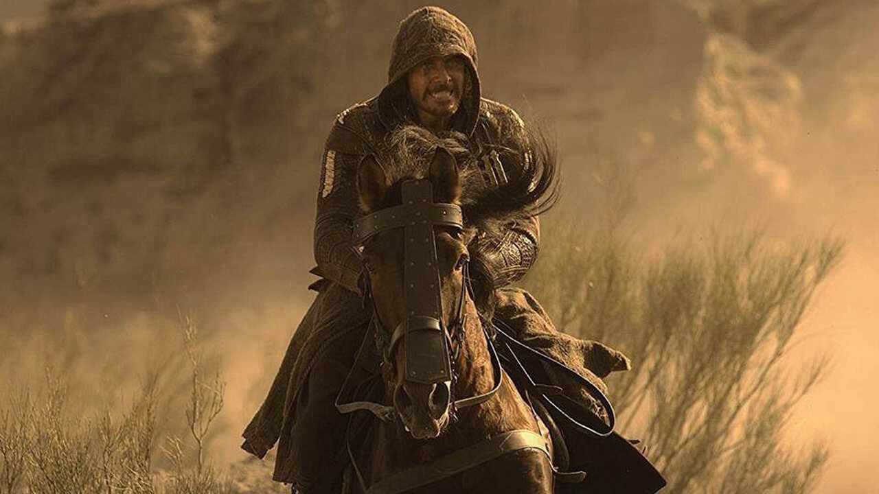 Now what could possibly be positioned just conveniently off-screen to make our hero grin like that?