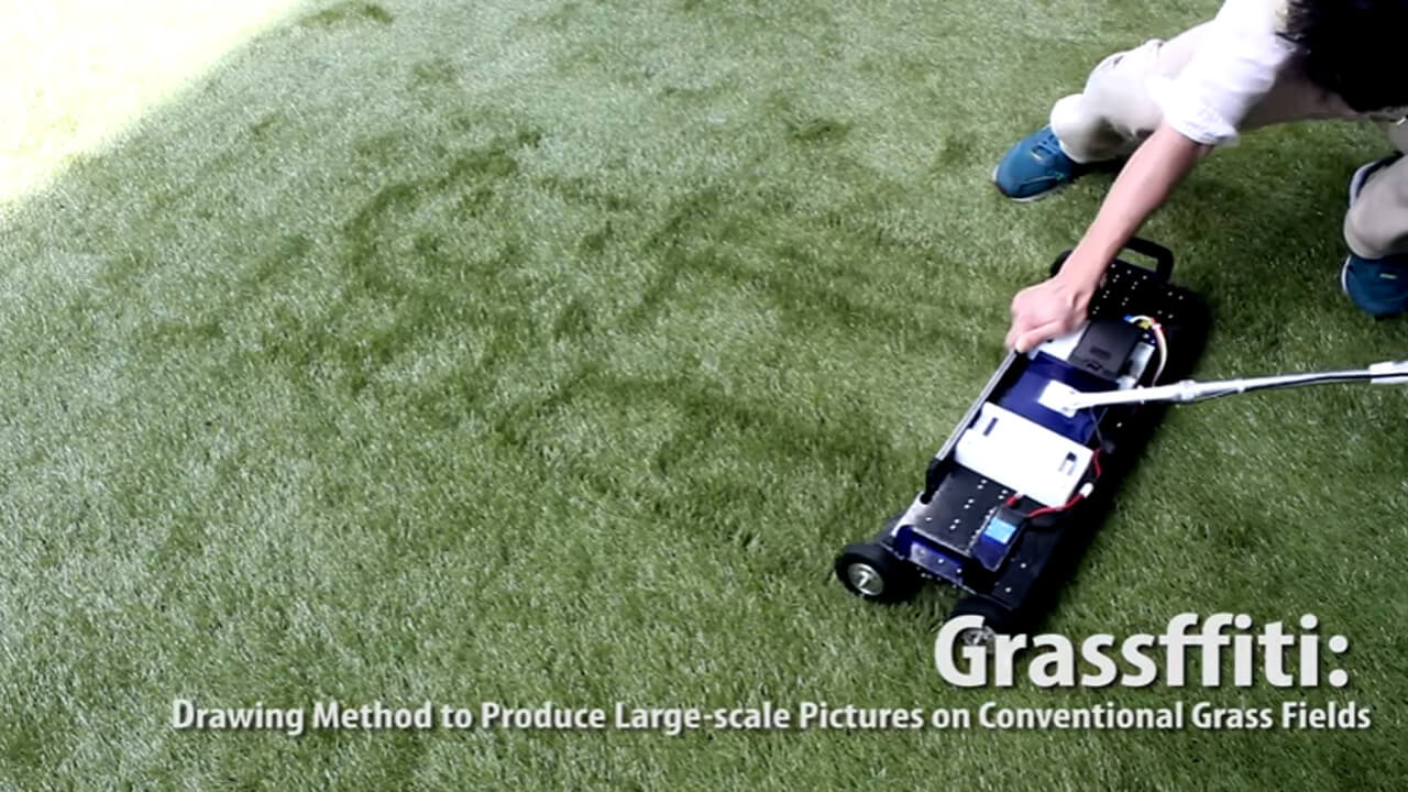This Grassffiti Lawn Mower Can Draw On Your Yard! grassffiti