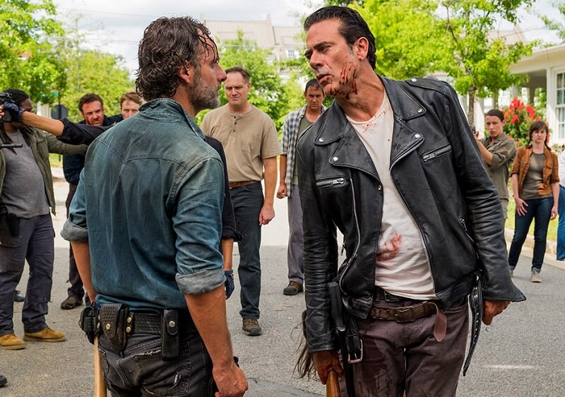 Rick facing off against a bloody Negan