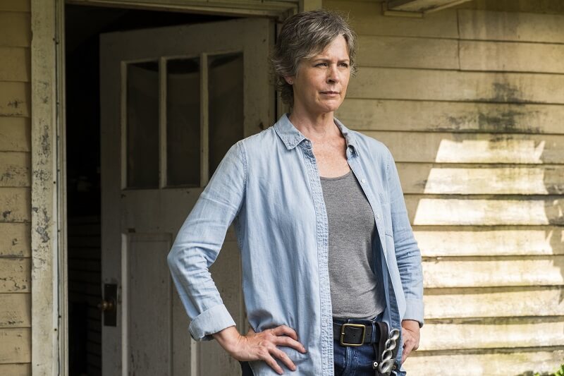 Carol looking at unknown person(s) from her house on The Walking Dead