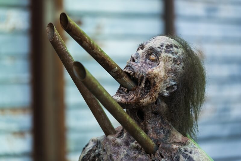 Walker stuck on posts on the walking dead