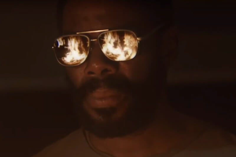 Victor Strand with flames reflecting in sunglasses on Fear the Walking Dead