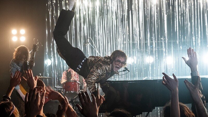 Elton John floating in Rocketman