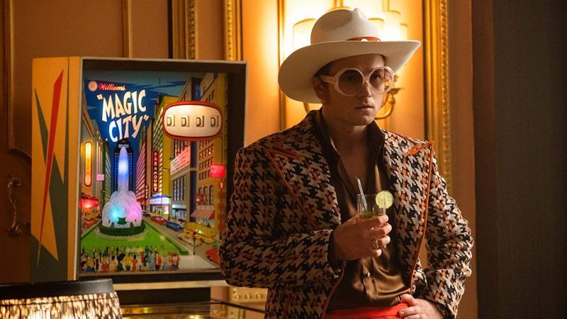 Elton John drinking in Rocketman