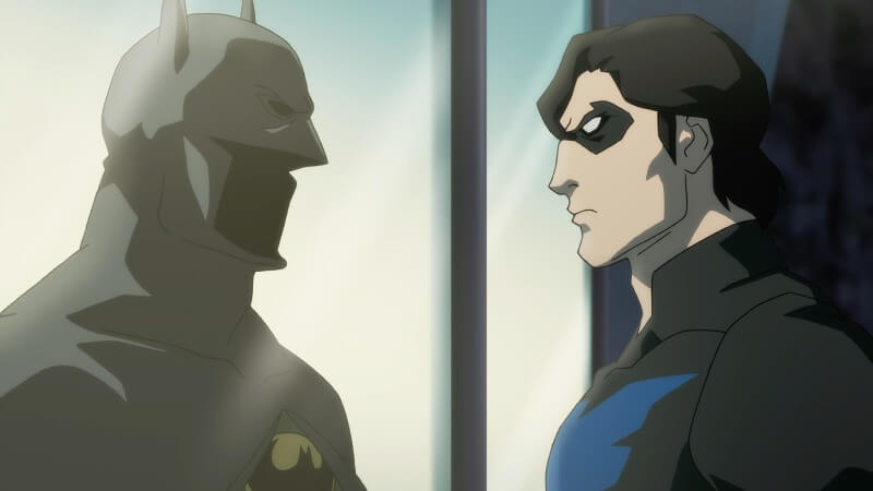 Nightwing looking at Batman's suit