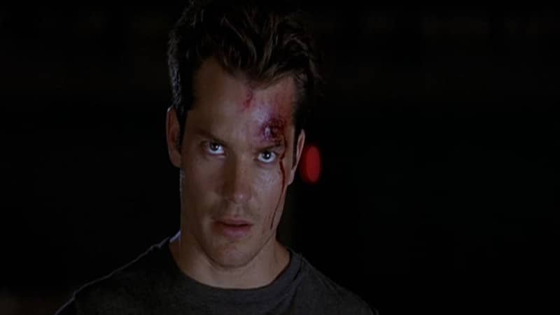 Mickey as the Ghostface killer in Scream 2