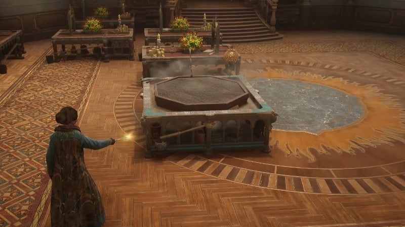 Placing down a Large Planter in Hogwarts Legacy Image Sourced from YouTube WoW Quests