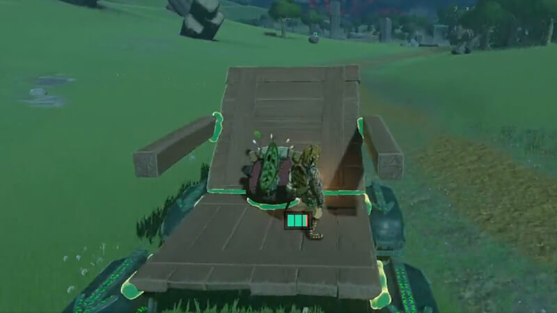 Link relaxing in a traveling chair.