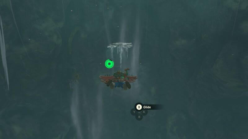 Glide down to this cavern to find the Frostbite Headdress in a treasure room.