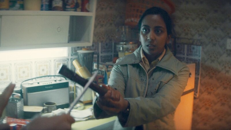 Nidia wards off an assailant on Black Mirror episode Demon 79
