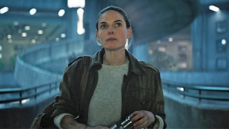 Rebecca walking the stairs of the interior