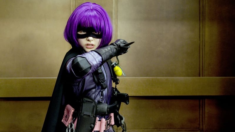Chloe Grace Moretz posing as Hit-Girl in Kick-Ass.