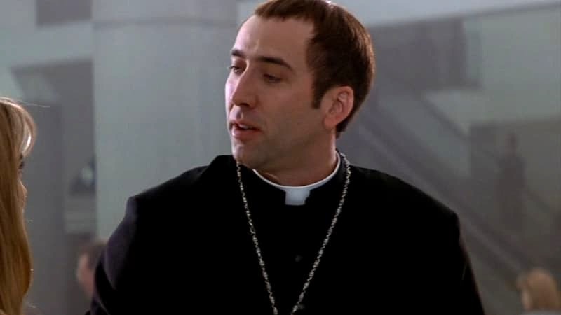 Nicolas Cage dressed as a priest in Face/Off