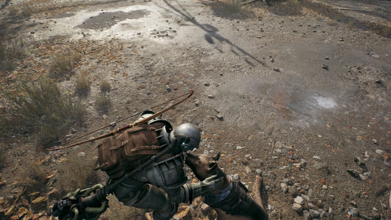 A Handler pets his dog in Remnant 2.