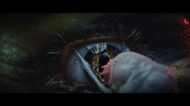 A Mind Flayer parasite approaches a victim's eye in Baldur's Gate 3