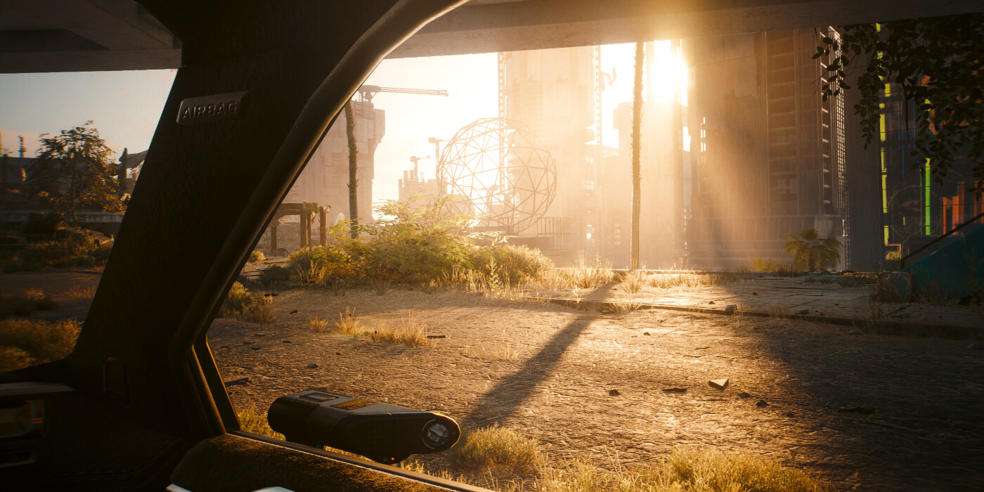 Light streams across a Dogtown street in Cyberpunk 2077: Phantom Liberty