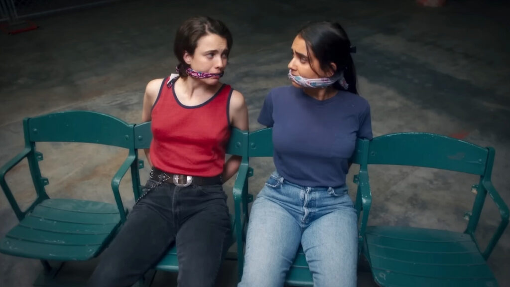 Marian and Jamie tied up in Drive-Away Dolls