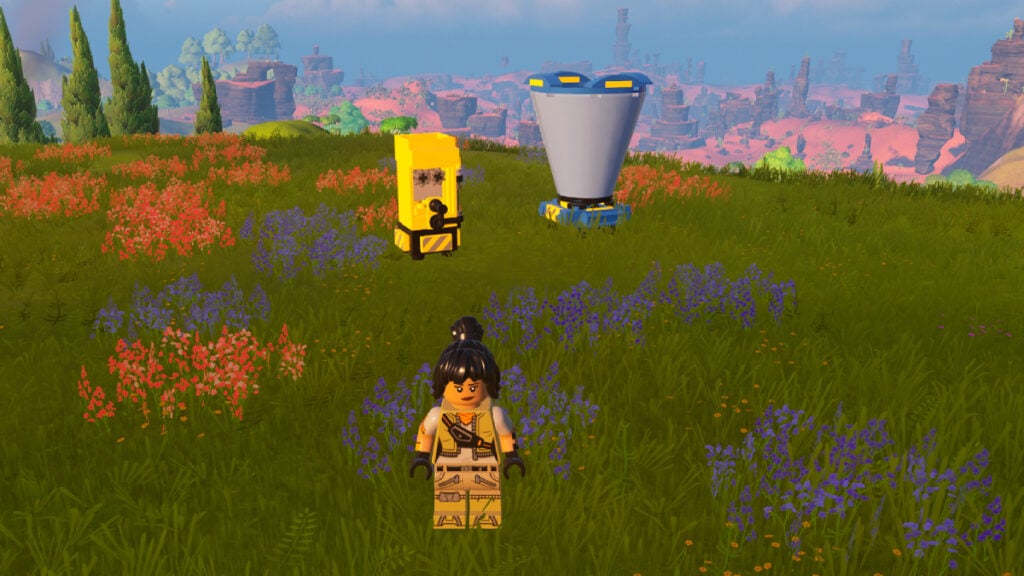 How To Get (& Use) Bait Bucket in Lego Fortnite Lego Fortnite character standing infront of the Juicer and Food Processor