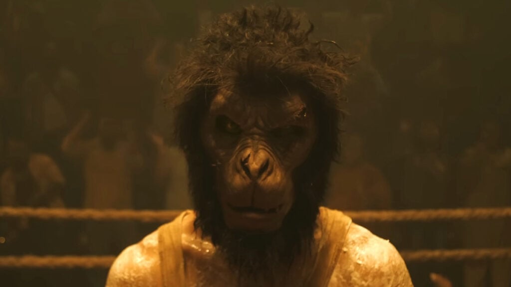 Monkey Man Review — Kid Goes Ape Kid as the Monkey fighter in the action movie Monkey Man