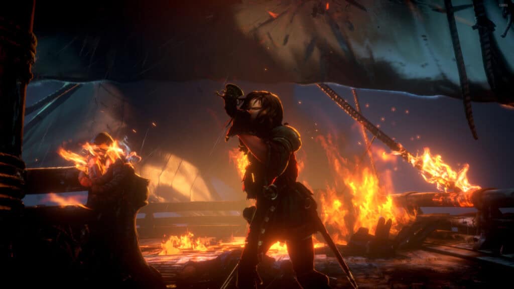 A woman blows a horn while standing on the deck of a burning ship