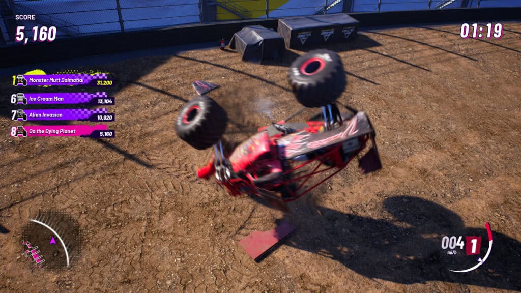 A truck wrecks during a stunt course