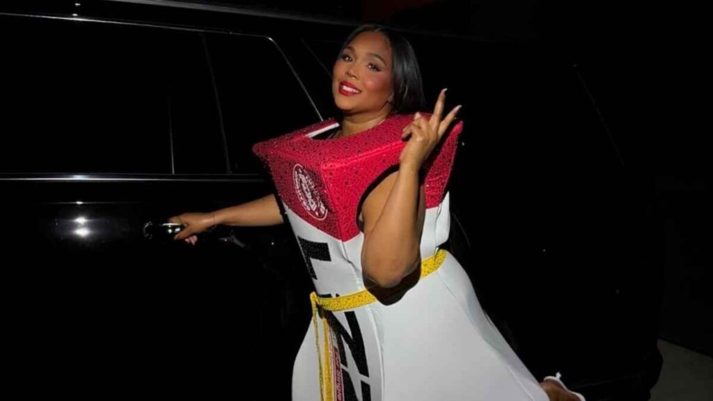 Lizzo’s Ozempic Halloween Costume Deemed ‘Iconic’ By Fans After Singer Denies Allegations of Using Weight Loss Drug Lizzo's Ozempic Halloween Costume