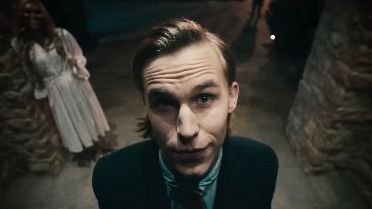 polite leader in foreground of scene in the purge 2013