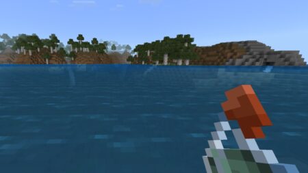 How To Breathe Underwater and Live the Aquatic Life in Minecraft The player looks across the water to distant land while holding a Potion of Water Breathing in Minecraft