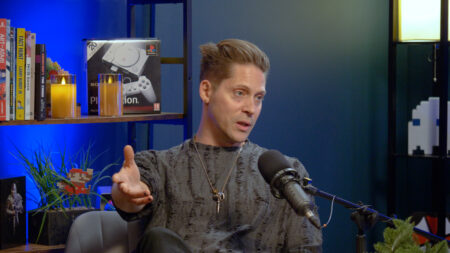 Neil Newbon Talks BG3, Empathy, and the Art of Games: ‘What About the Monster’s Feelings?’ Neil Newbon gestures during an interview with GINXTV