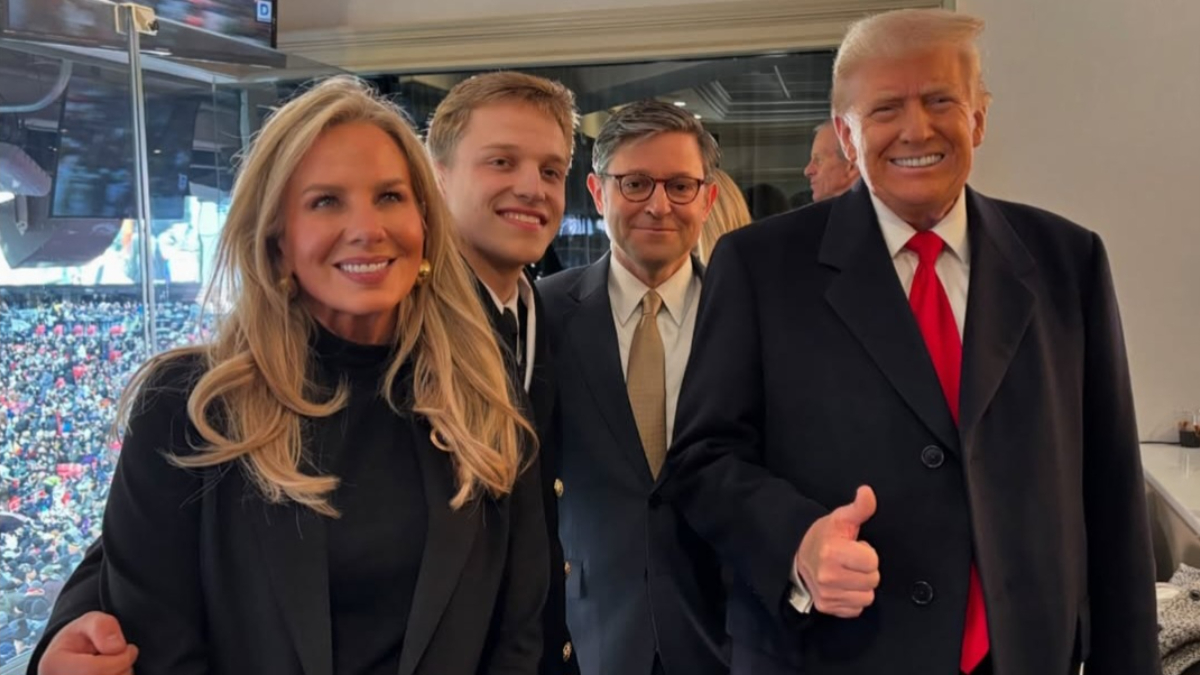 Speaker of the House Mike Johnson poses for a group photo with Donald Trump