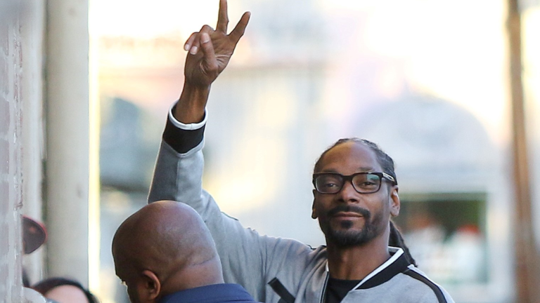 Snoop Dogg Leaves The Voice Amid Ongoing Diddy Scandal: ‘Adam Didn’t Go to Diddy’s Parties Like Snoop Dogg Did’ Snoop Dogg peace sign