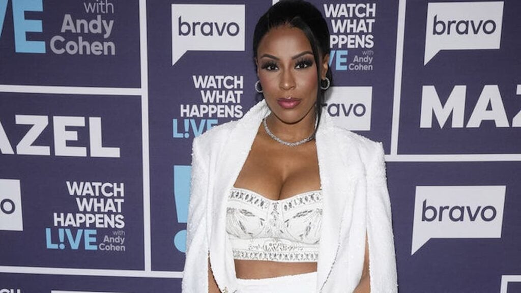 RHODubai’s Caroline Brooks Slams Her Co-Stars After Bravo Puts Show on Pause: ‘This Cast Wasn’t Really Friends’ Caroline Brooks posing on WWHL red carpet.