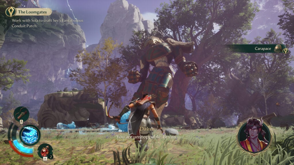 Brynn crouches as a slain giant collapses in an explosion of dust and debris