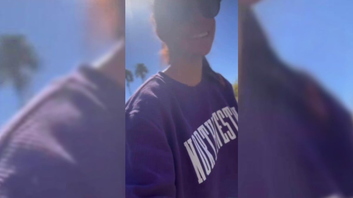 Meghan Markle in a purple Northwestern University sweater.