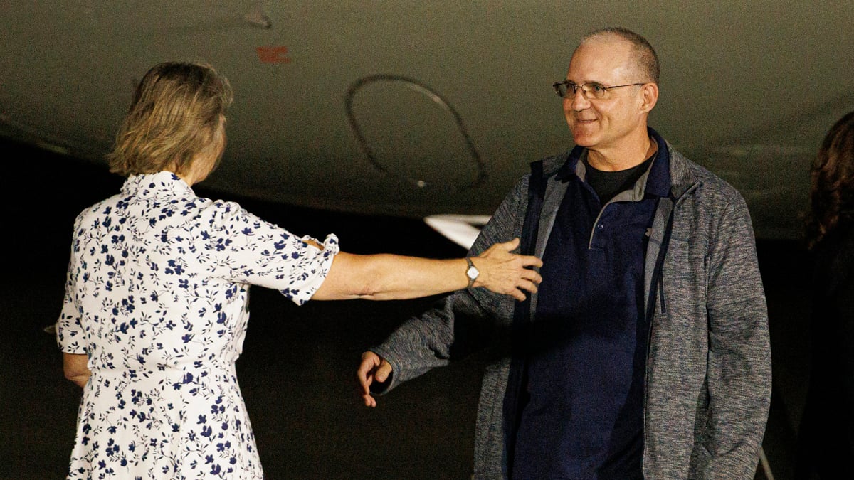 Paul Whelan seen greeting his family at Andrews Air Force Base