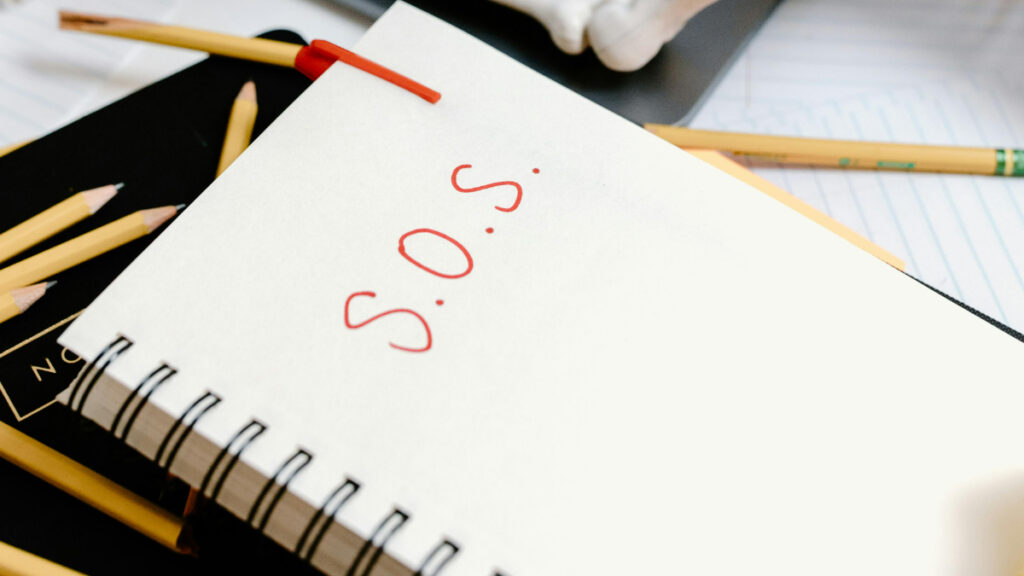 Donald Trump vs. the Veteran Suicide Prevention Hotline: ‘They Want Us All Depressed, Hopeless and/or Dead’ A spiral notebook with S.O.S. written on the paper in red ink