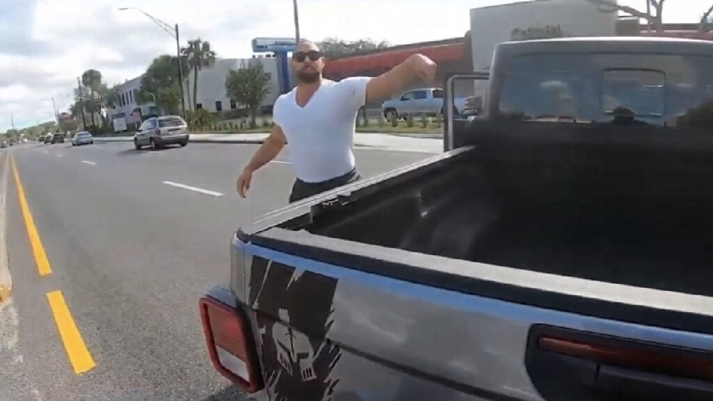 Florida Ram Truck Driver Dangerously Blocks Road, Acts Like He’s the Victim: ‘Looks Like Temu Andrew Tait’ Florida ram truck driver road rage