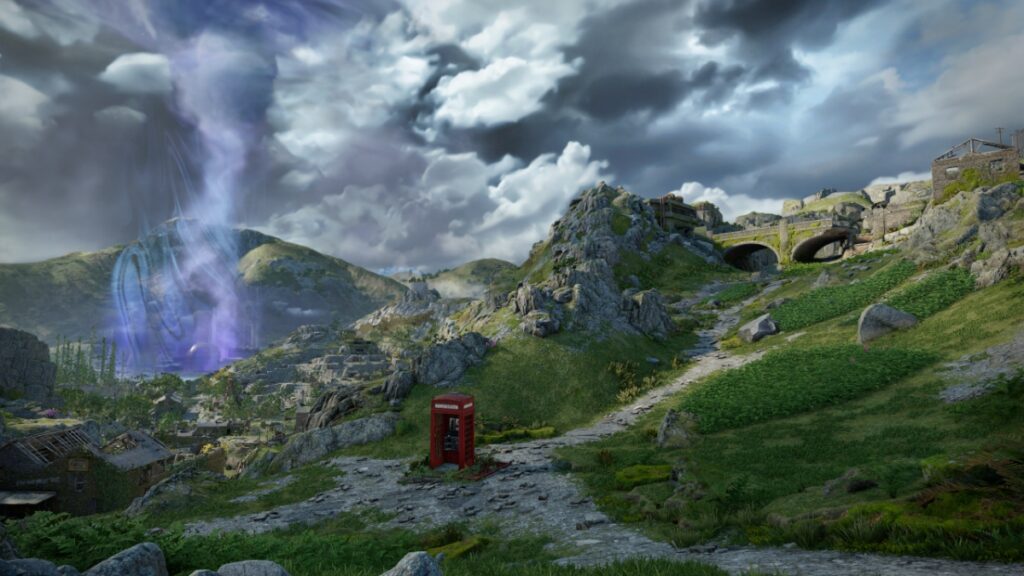 A storm looms behind a red phone booth in the countryside