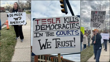 Signs seen at the Columbus protest against Tesla and Musk in Ohio