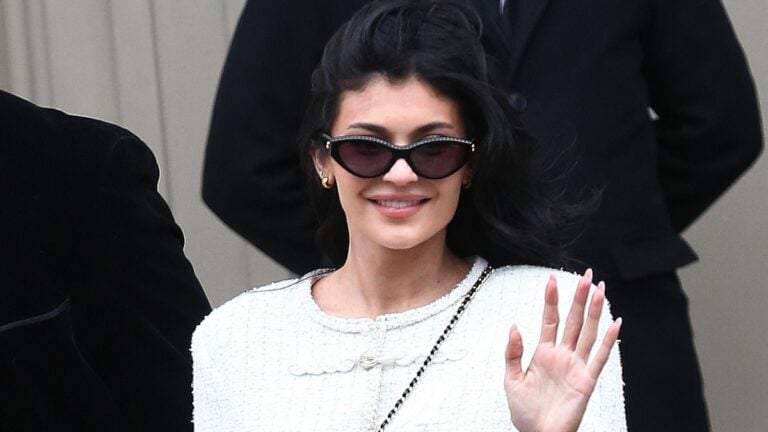 Kylie Jenner waves to cameras