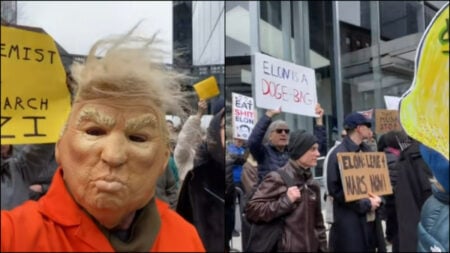 NYC Tesla Protest Features Trump Mask and Righteous Anger: ‘FDT and His Robot Bestie’ A person in a Trump mask poses with fellow protestors at a Tesla protest in NYC
