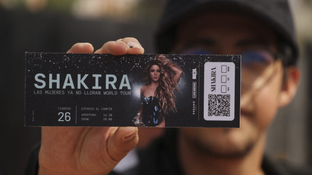 Shakira fan with ticket prior to concert