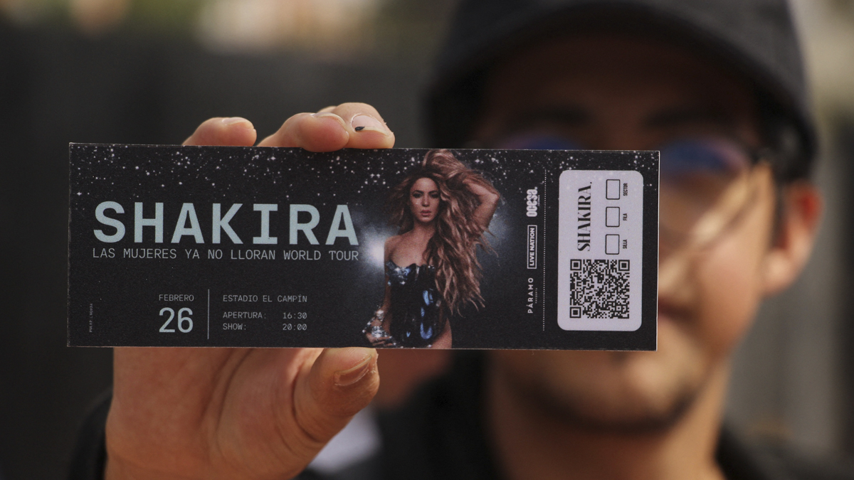 Shakira fan with ticket prior to concert
