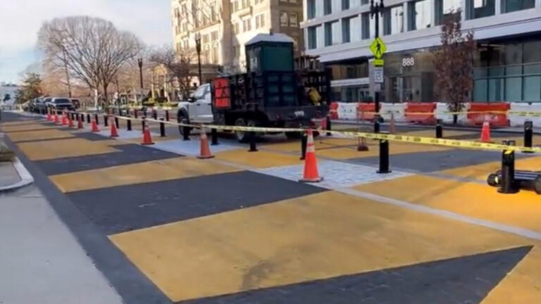 Washington, D.C. Residents Honor Black Lives Matter Plaza Before Its Removal: ‘The Pointy White Hoods Are On’ The Black Lives Matter mural painted on a street in Washington, D.C.