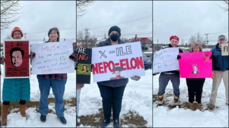 Maine Tesla protestors in Waterville hold a variety of signs denouncing Elon Musk