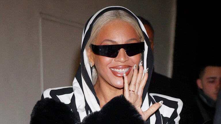 Beyonce is all smiles as she waves to fans while leaving 'Mea Culpa' screening at the Paris Theater